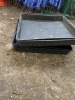 Five Black Plastic Trays