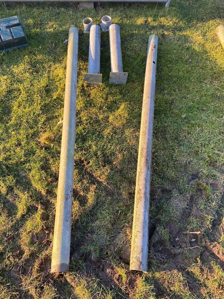 Pair of Round Steel Gates Posts with Ground Sockets and Caps